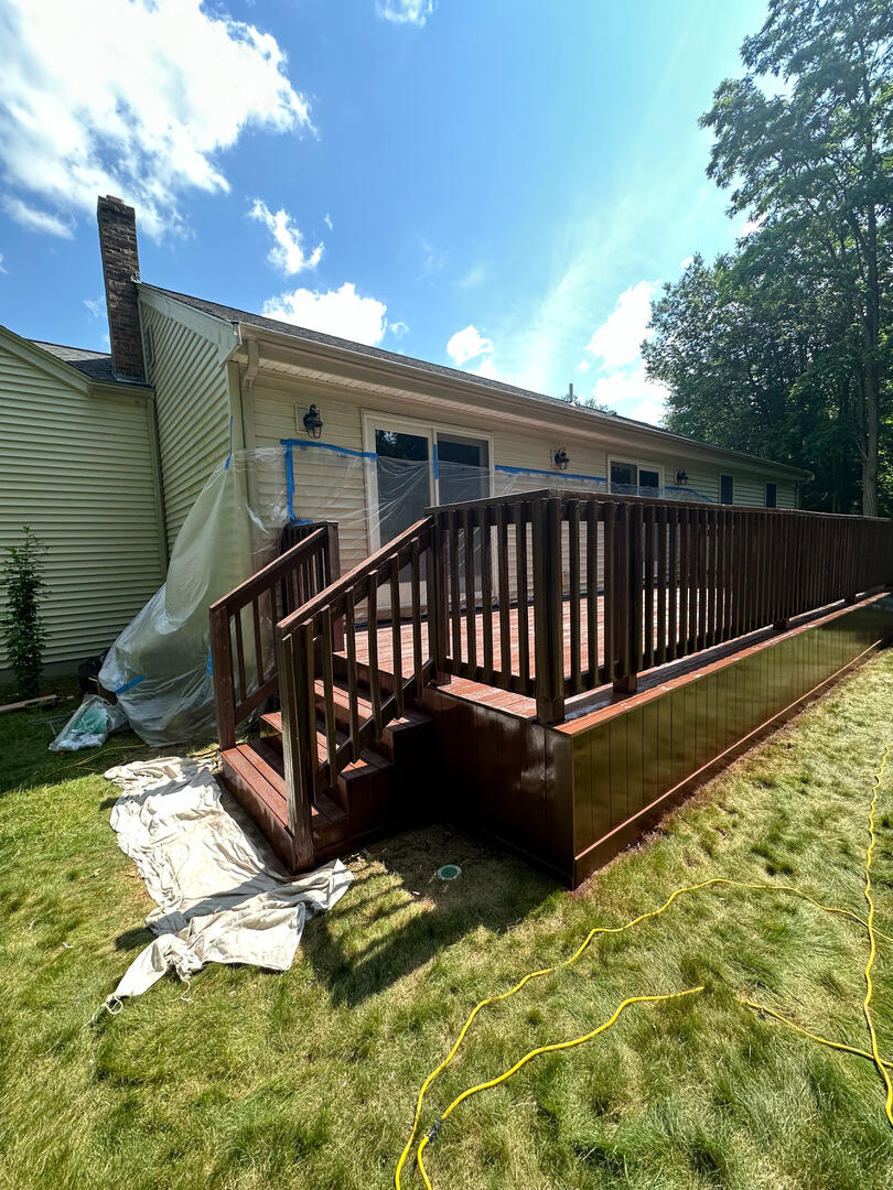 Untitled deck builders in Massachusetts work